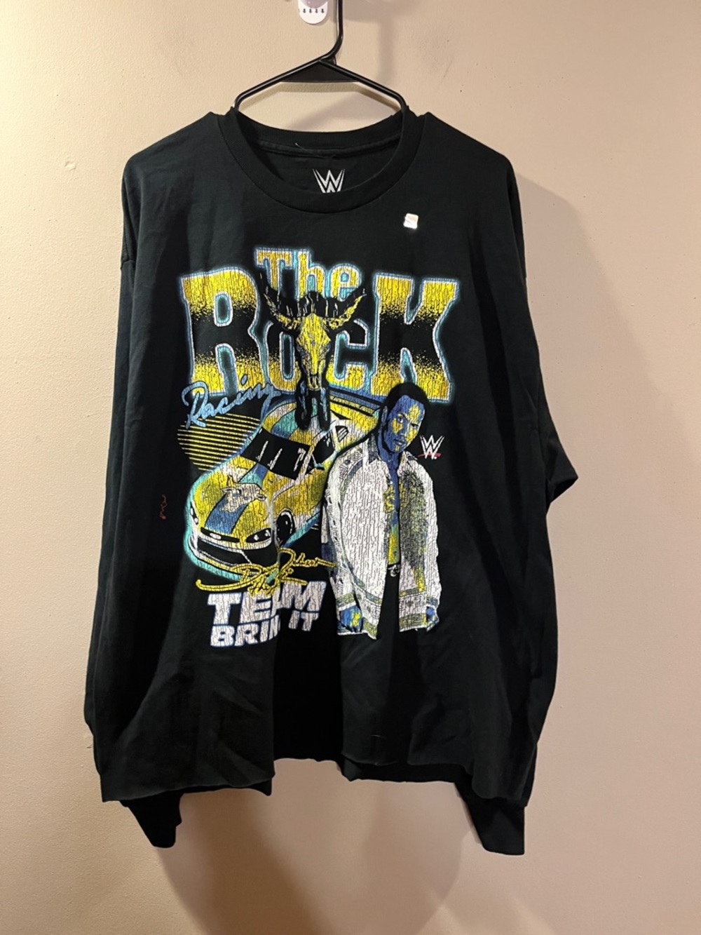 WWE Black Long Sleeve 'The Rock' Graphic Shirt with Yellow and Blue Accents